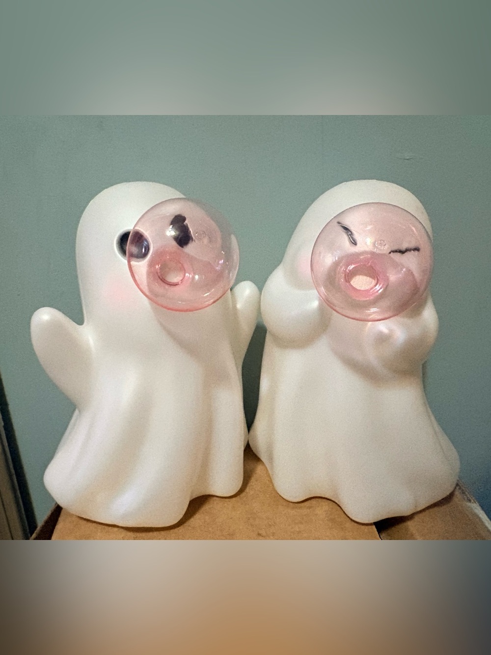Viral White Ghost Figurines with Pink Bubble Gum